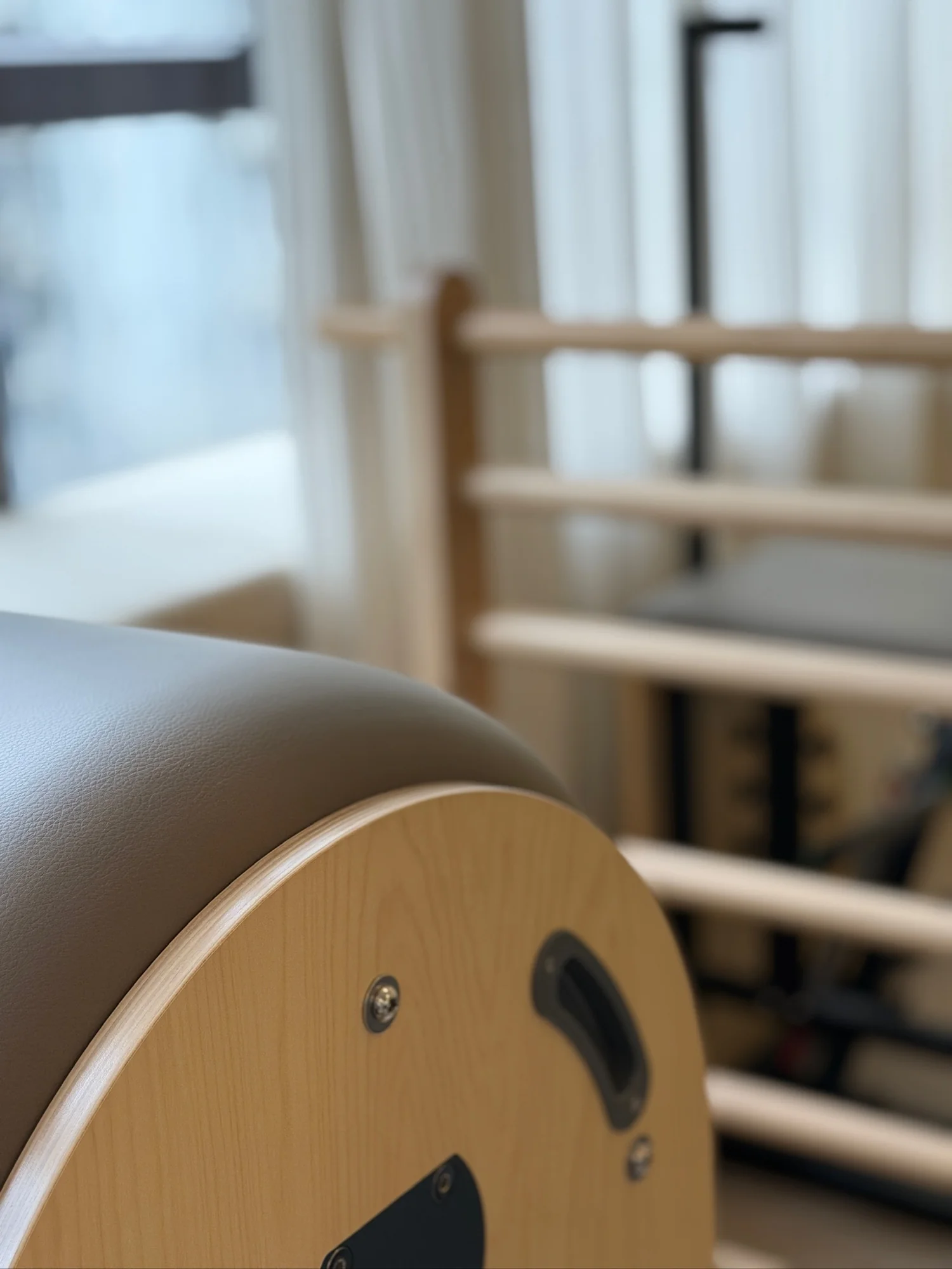 Wooden Pilates apparatus in the OMIYOGA studio